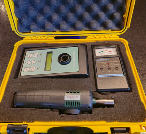 Professional mold inspection toolkit with moisture meters, hygrometers, and infrared cameras for accurate mold testing.